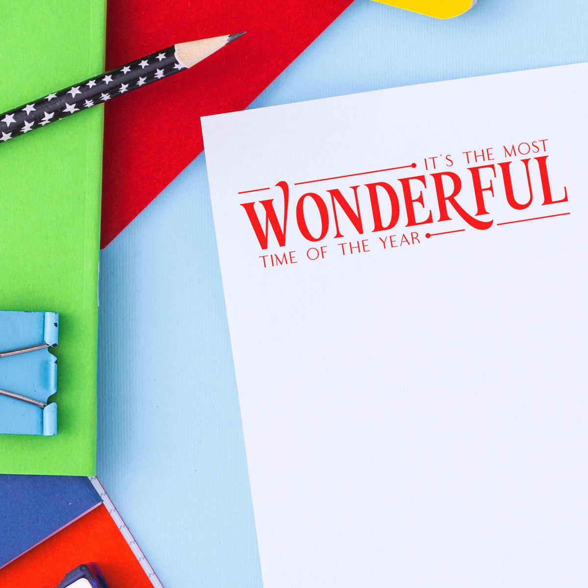Christmas rubber stamp impression reading Its the Most Wonderful Time of the Year on a holiday greeting card.