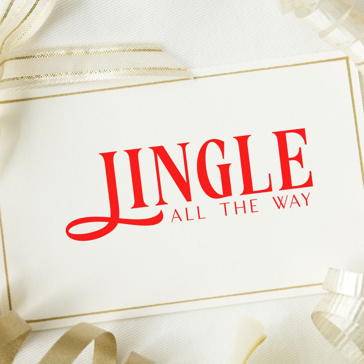 Jingle All the Way rubber stamp design in red on a white card with gold trim and ribbon accents.