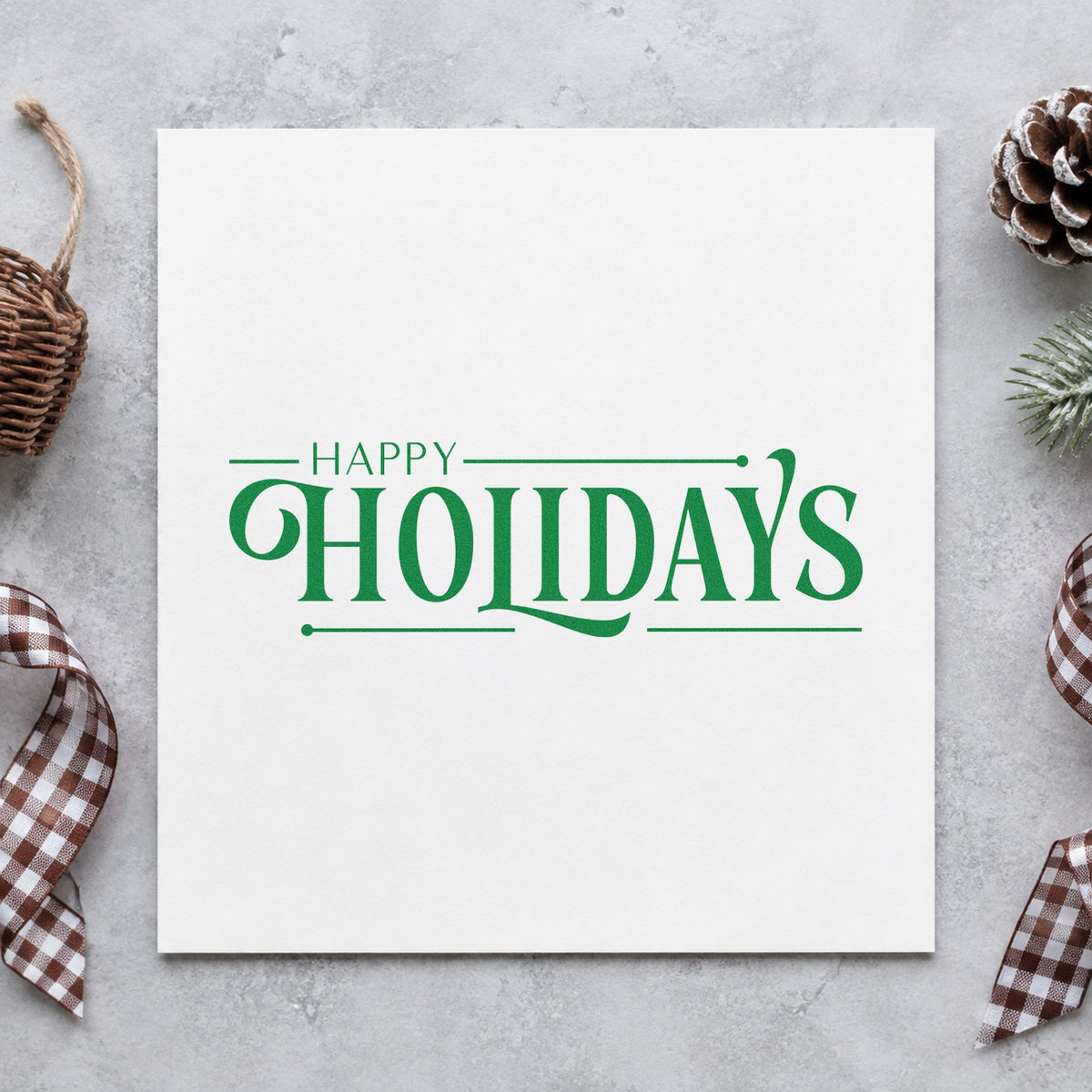 Happy Holidays Decorative Serif craft stamp imprint in green ink on a handmade project, one idea being staff lunch cards.