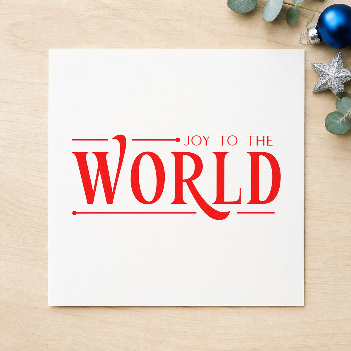 Joy To The World Serif rubber stamp shown in red ink, stamped for projects such as shelf final labels.