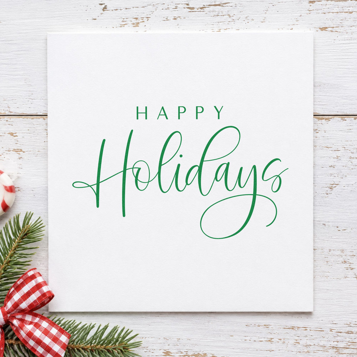 Happy Holidays Looped Script craft stamp in green ink on cardstock, an easy option for sign off album page.
