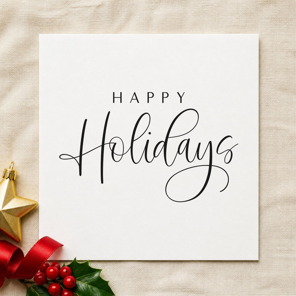 Happy Holidays Looped Script craft stamp imprint in black ink on a handmade project, one idea being swirl end gift tags.