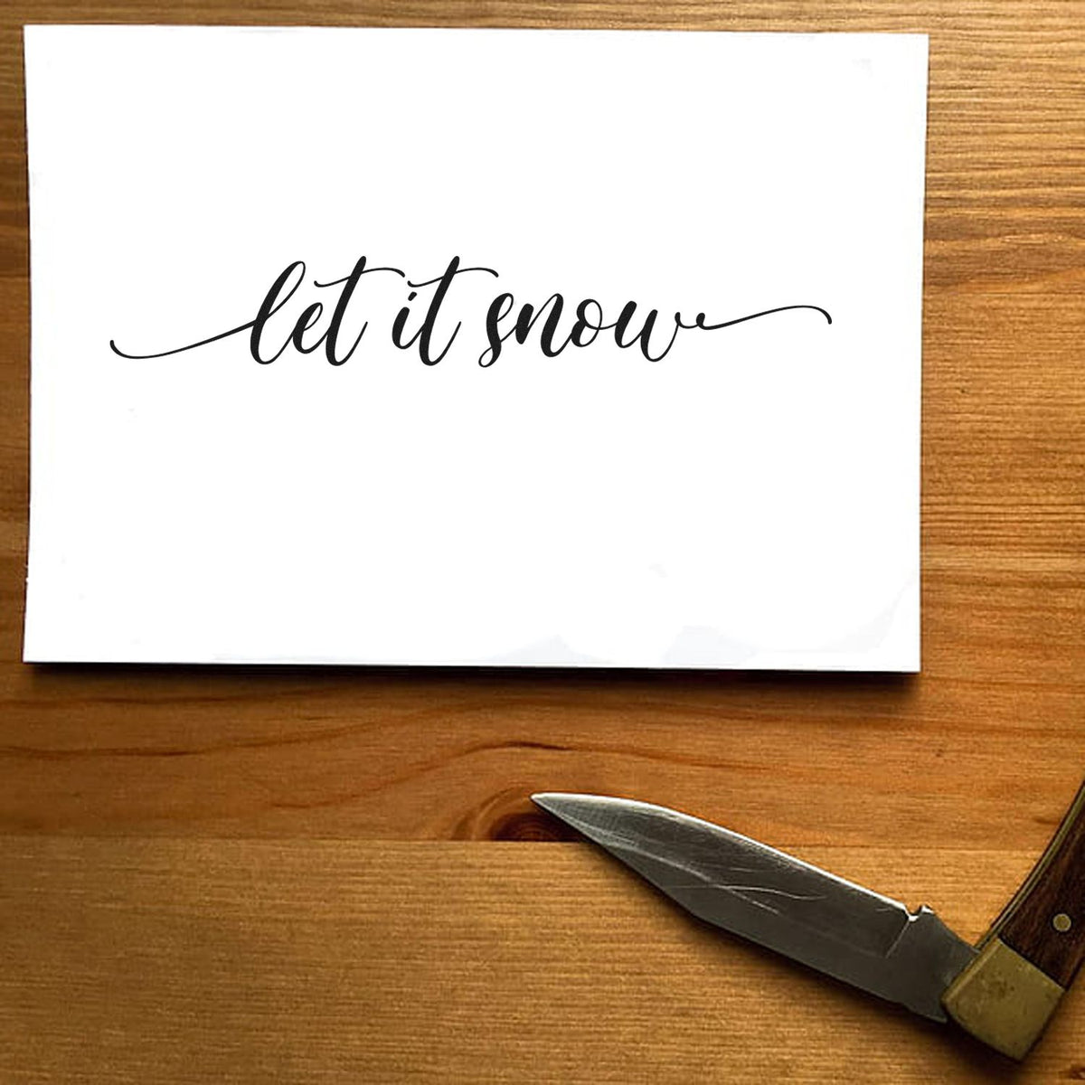 Let it snow script rubber stamp impression for winter card making and holiday paper crafts.