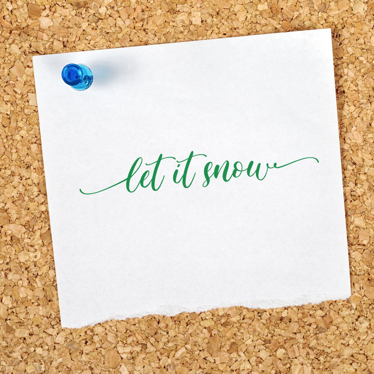 Green Let It Snow rubber stamp design on a pinned note, perfect for winter card making and holiday crafts.