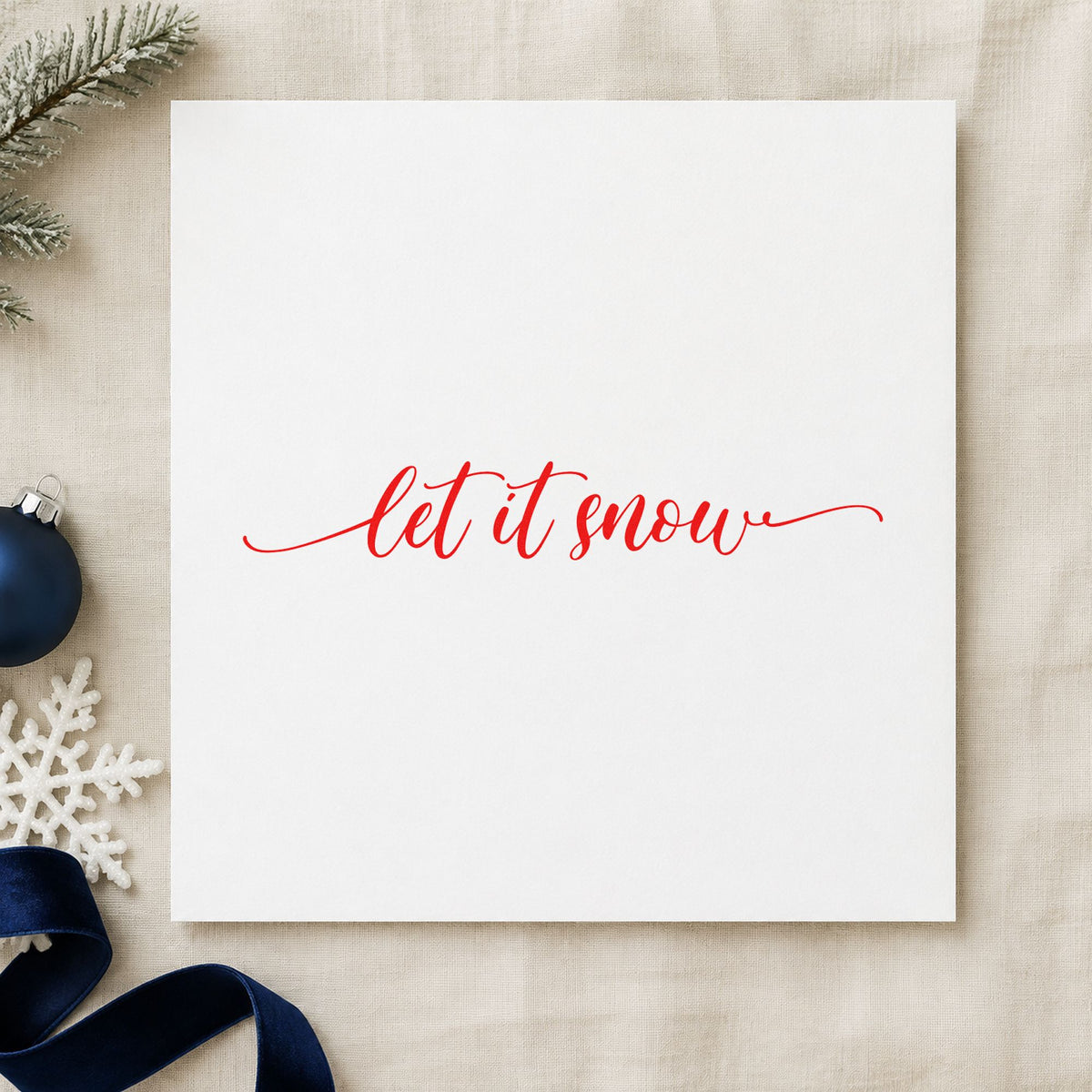 Let It Snow Flourished Line Script Lettering Rubber Stamp – Wood Handle in use 5