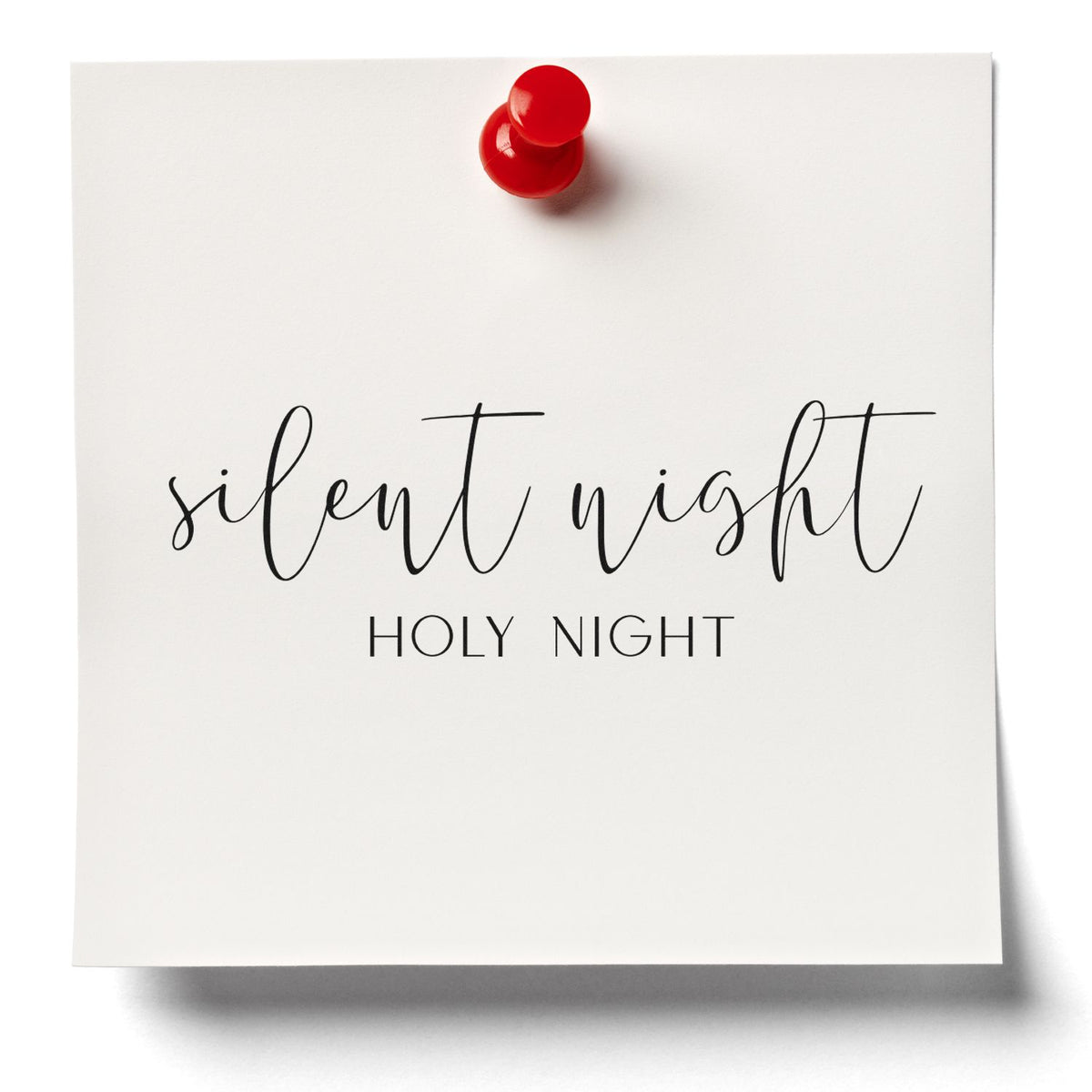 Silent Night Holy Night rubber stamp design on white paper, pinned with red pushpin, for Christmas card making.
