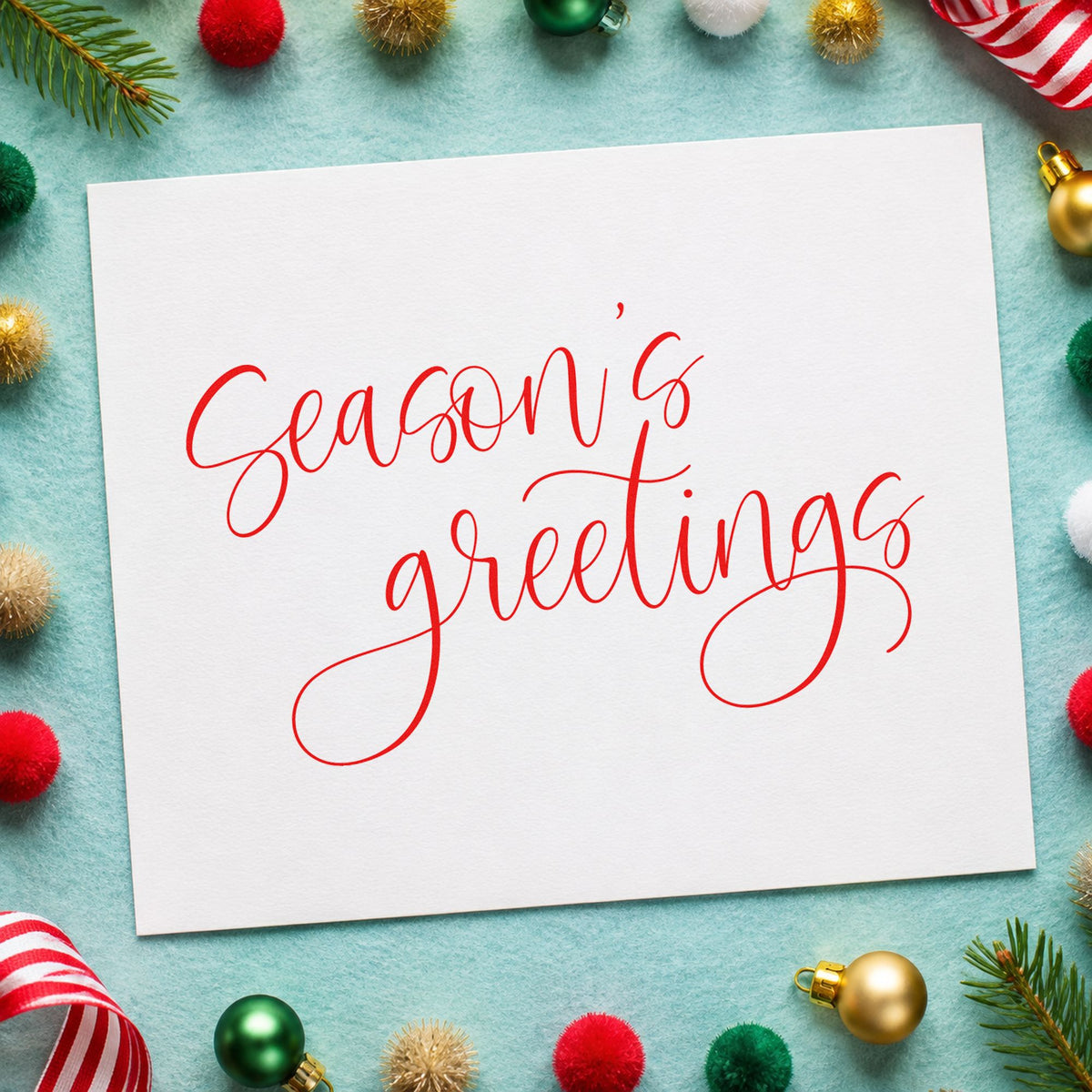 Season's Greetings Fine Calligraphy rubber stamp shown in red ink, stamped for projects such as box band labels.