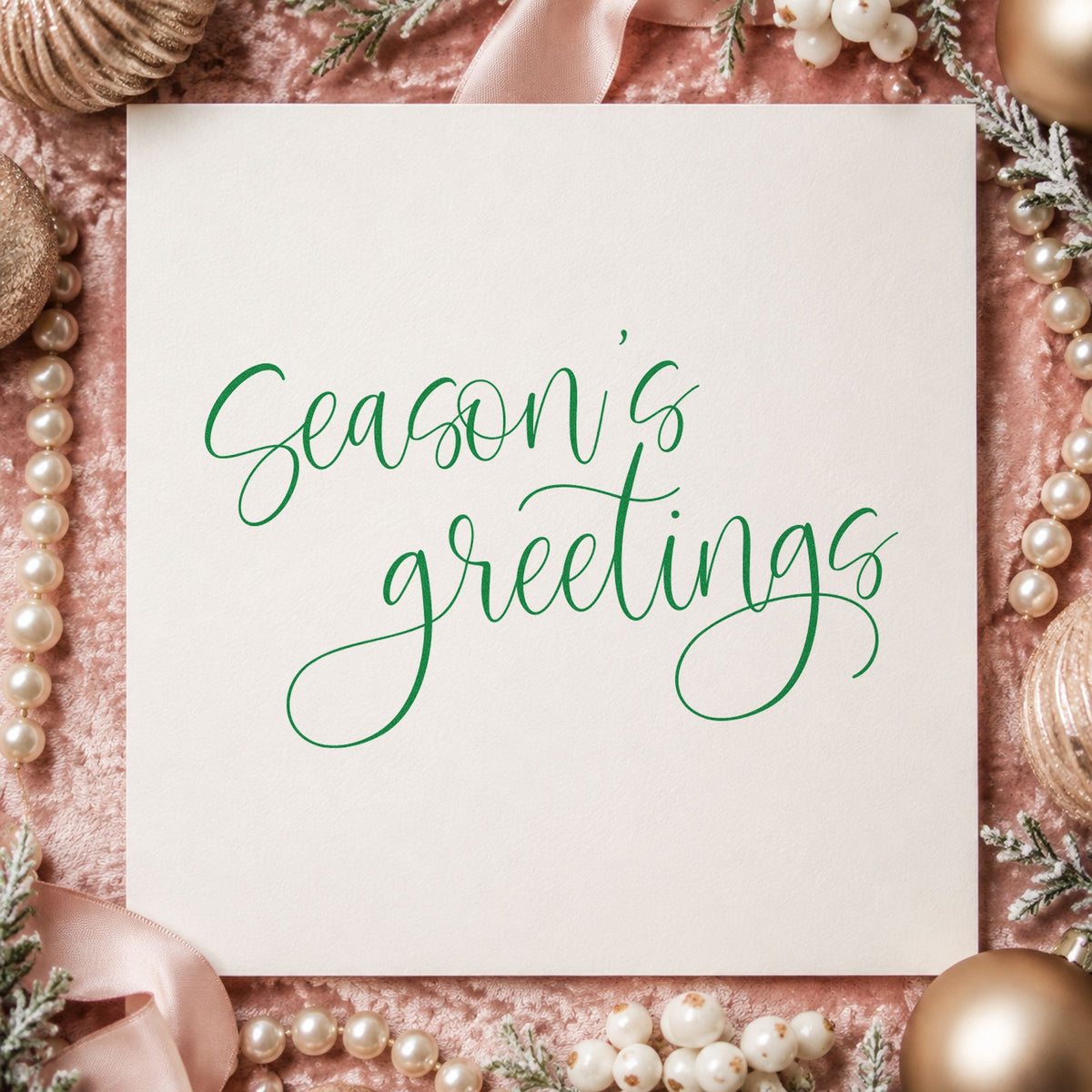 Season's Greetings Fine Calligraphy craft stamp imprint in green ink on a handmade project, one idea being formal dinner slips.