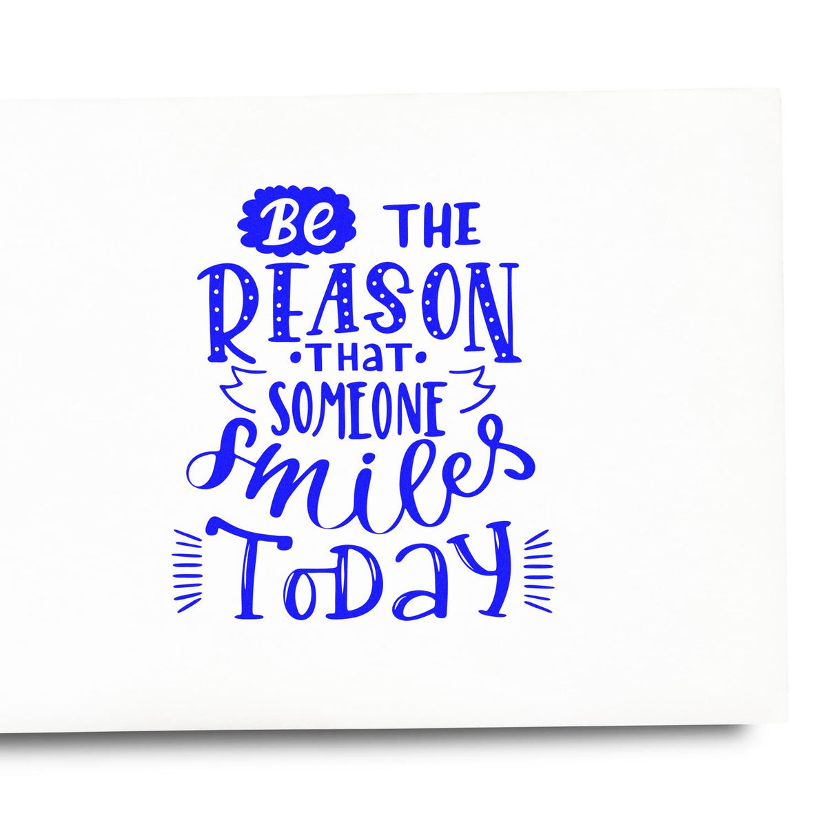 Positive rubber stamp design with quote, Be the reason that someone smiles today, in blue lettering.