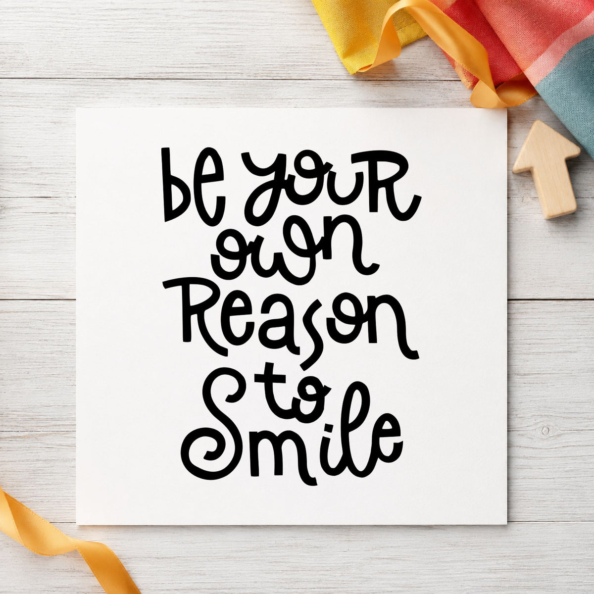 Be Your Own Reason Smile craft stamp imprint in black ink on a handmade project, one idea being bath set gift tags.