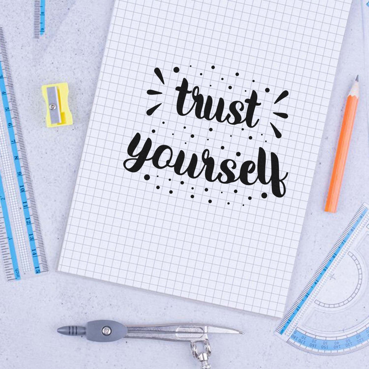 Trust Yourself motivational rubber stamp design on notebook paper with school supplies
