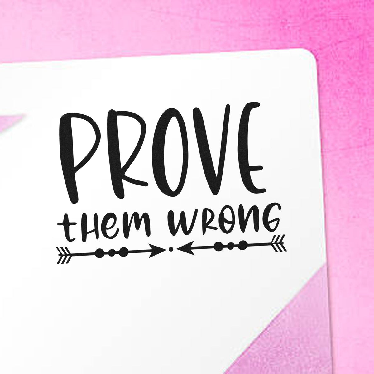 Inspirational rubber stamp design reading Prove Them Wrong with arrow accents for motivational crafts and stationery.
