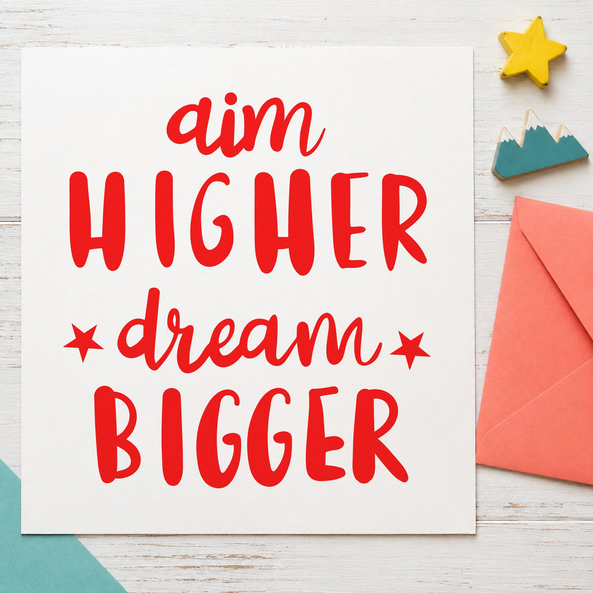 Aim Higher Dream Bigger rubber stamp shown in red ink, stamped for projects such as bin part labels.