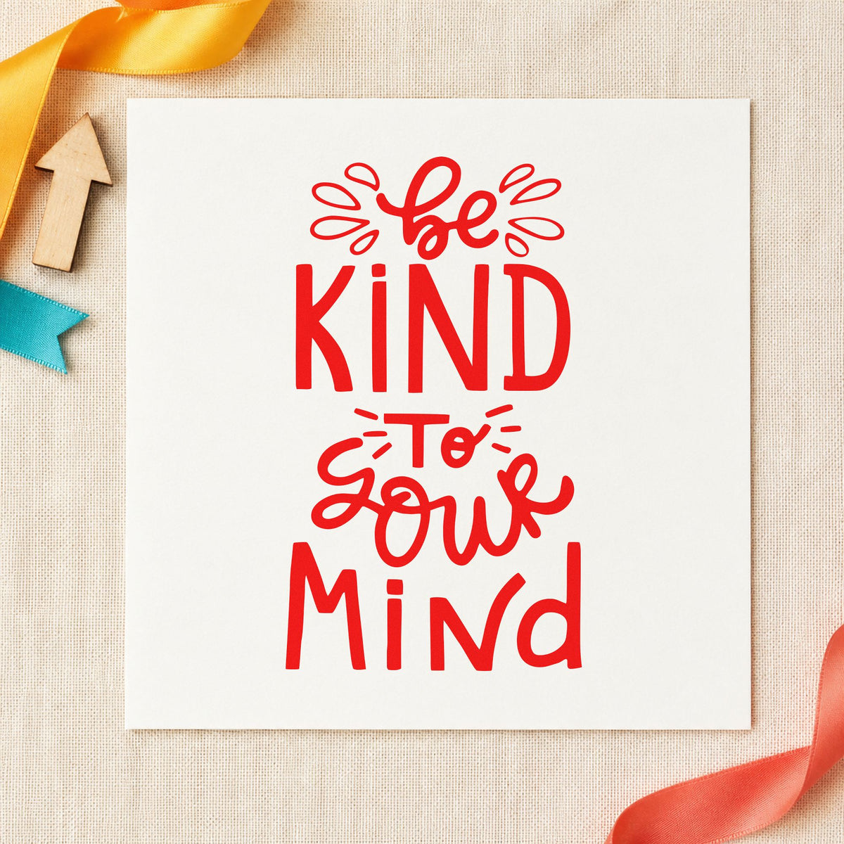 Be Kind To Your Mind rubber stamp shown in red ink, stamped for projects such as basket blanket labels.
