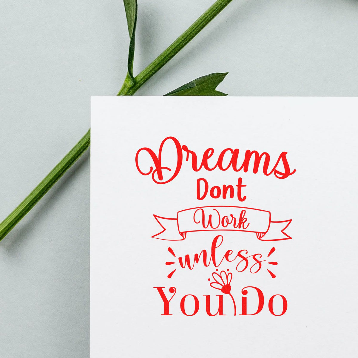 Motivational rubber stamp design reading Dreams Dont Work Unless You Do for handmade cards, planners, and craft projects.