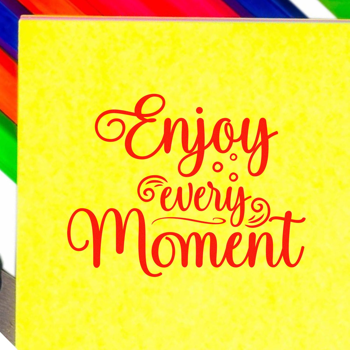 Enjoy Every Moment decorative rubber stamp design on yellow background for craft, journaling, and stationery projects.