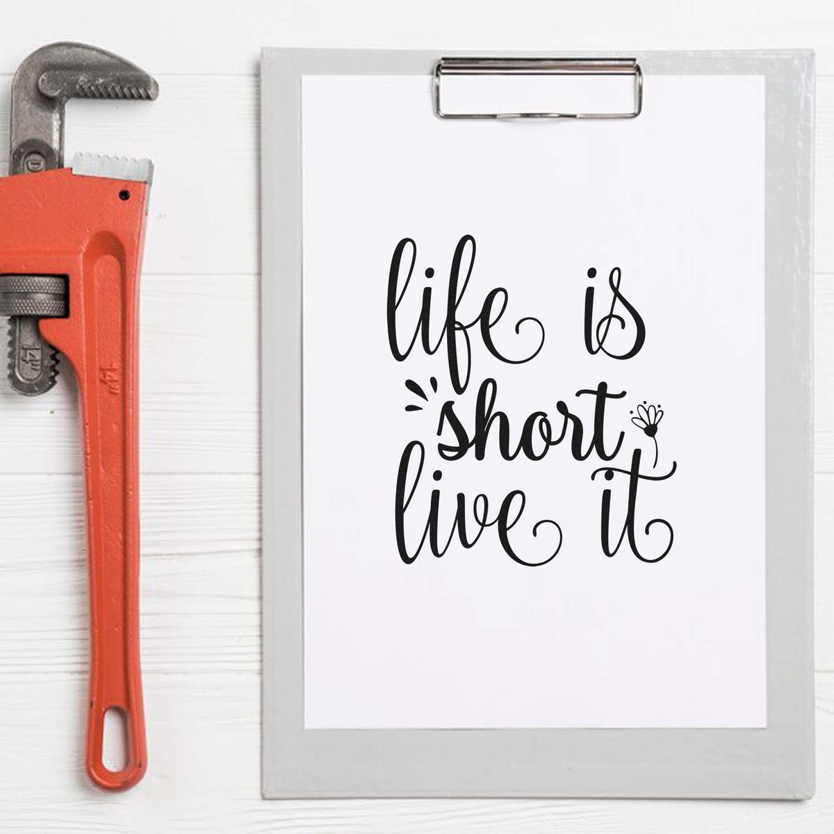 Life is Short, Live It decorative script rubber stamp design on clipboard for DIY crafts and paper projects.
