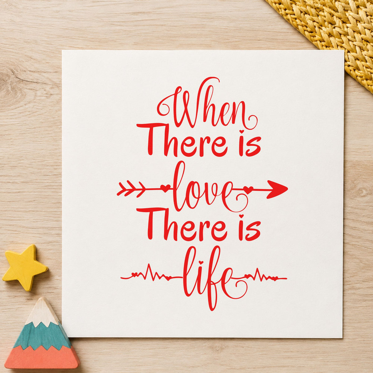 When There Is Love craft stamp imprint in red ink on a handmade project, one idea being story prompt cards.
