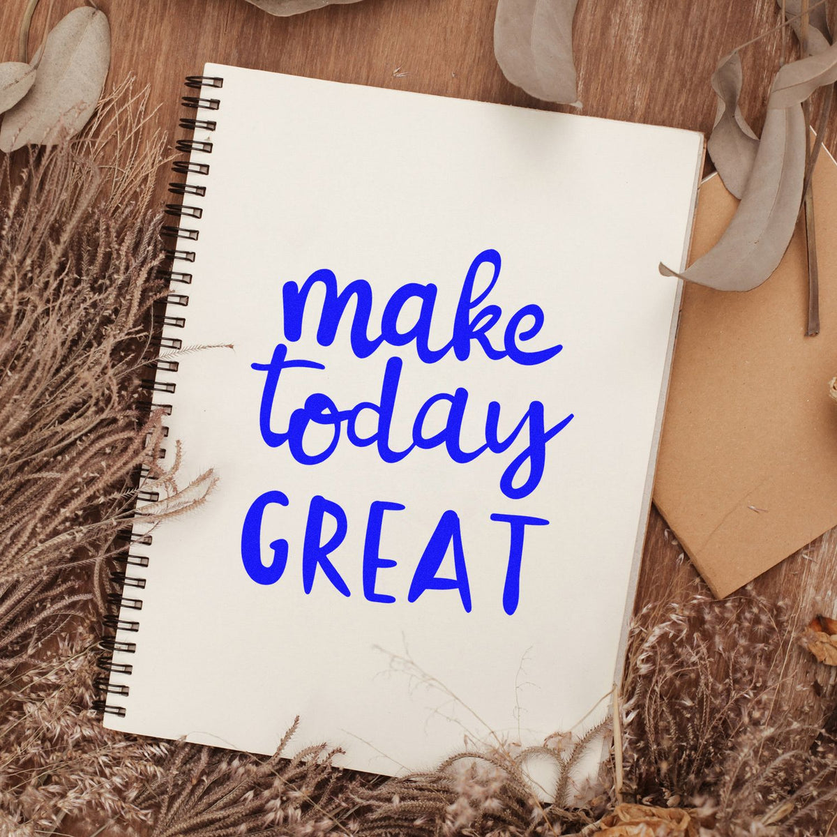 Make Today Great rubber stamp imprint in blue on a notebook page, perfect for journaling, planners and craft projects.