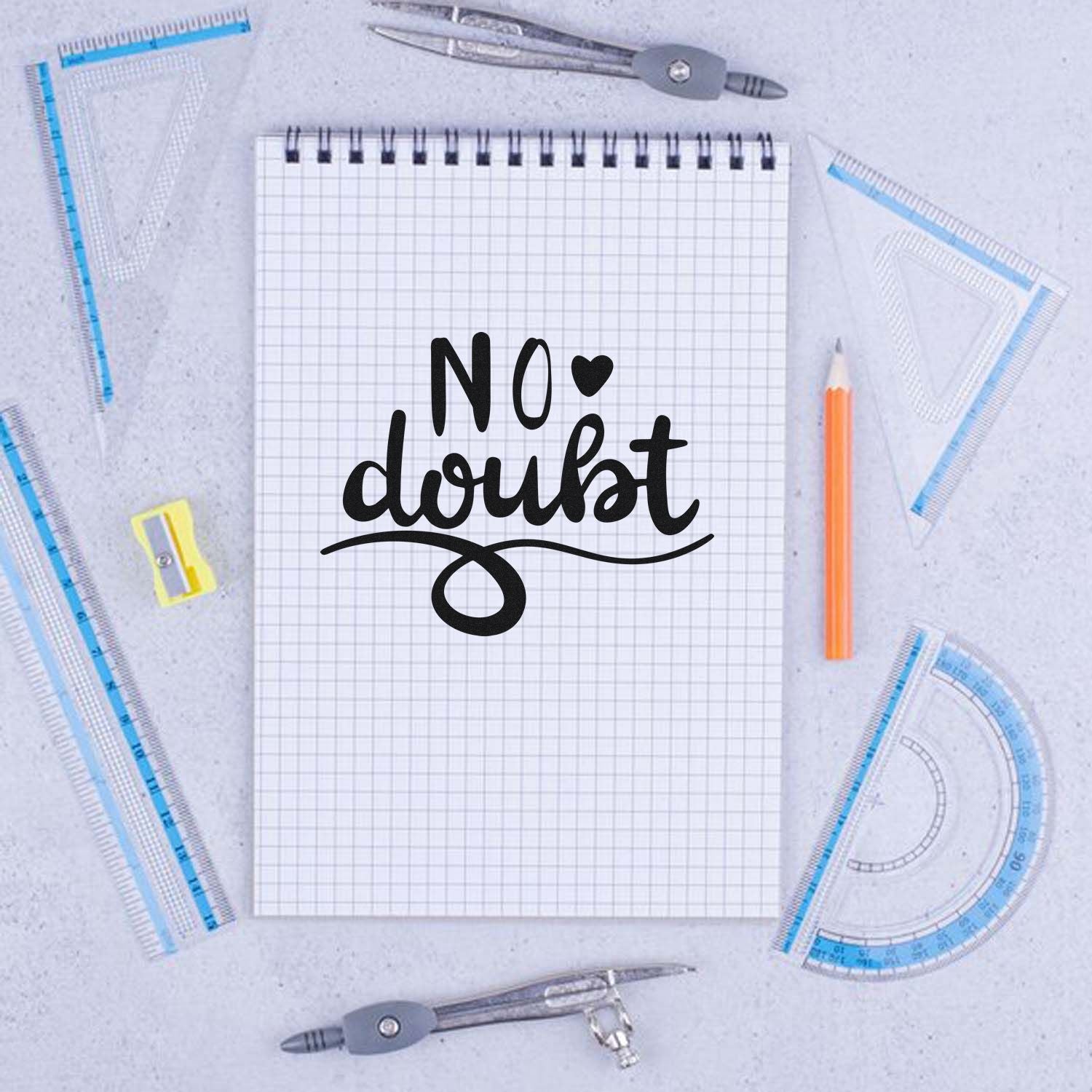 No doubt rubber stamp design on graph notebook, ideal for stationery, teachers, and craft projects.