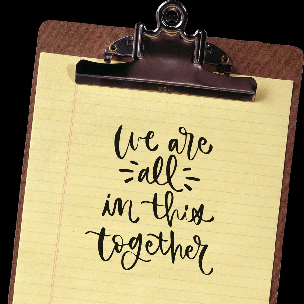 Motivational rubber stamp design reading we are all in this together for crafts, planners, and handmade projects.