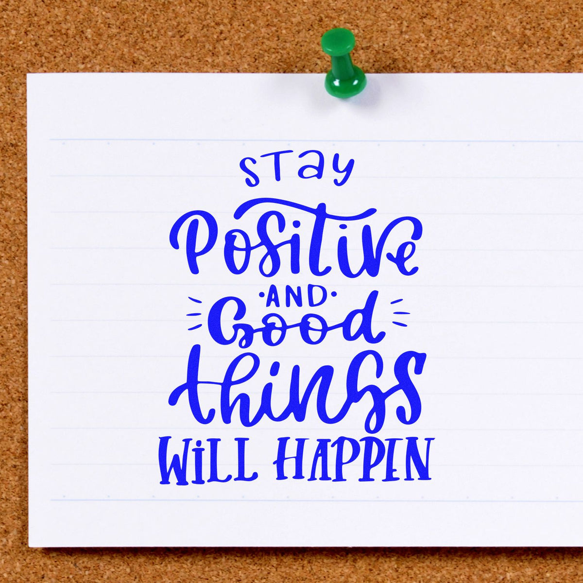 Blue inspirational rubber stamp design reading Stay positive and good things will happen on pinned note.