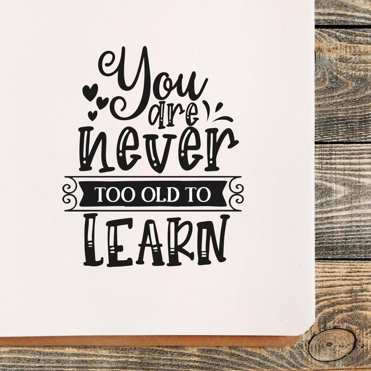 Rubber stamp design with the phrase You are never too old to learn for educational crafts, journaling, and handmade cards.