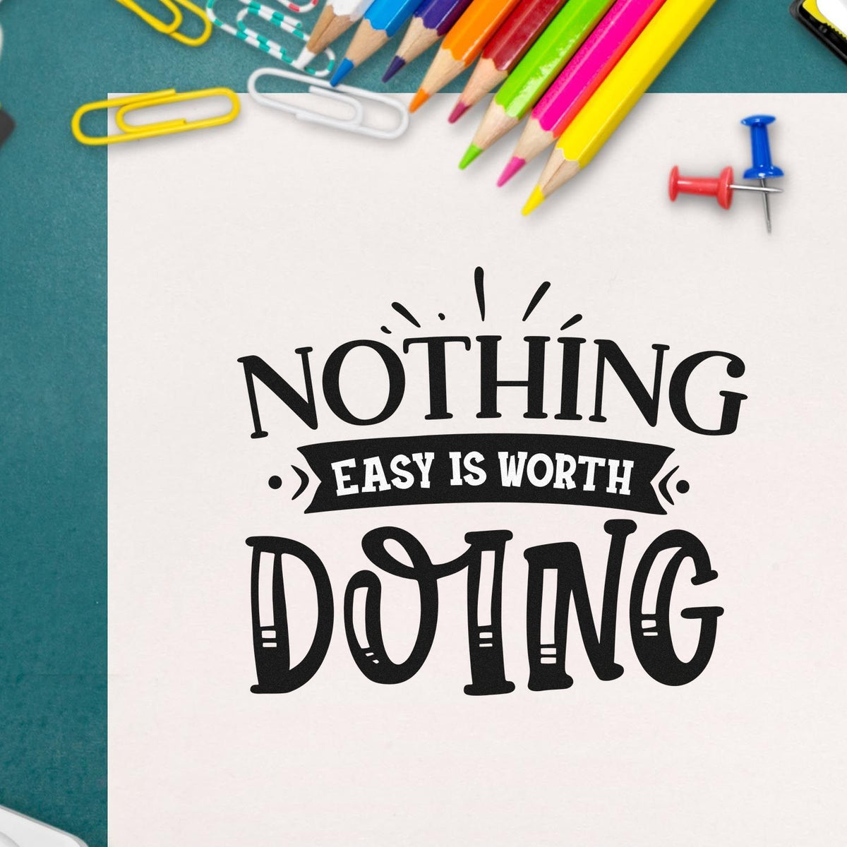 Custom rubber stamp design with Nothing Easy Is Worth Doing quote, perfect for inspirational stationery and craft projects.