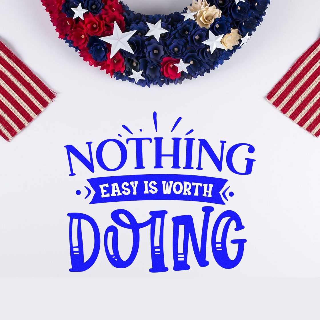 Patriotic rubber stamp design with quote Nothing easy is worth doing in bold blue text, framed by red, white and blue decor.
