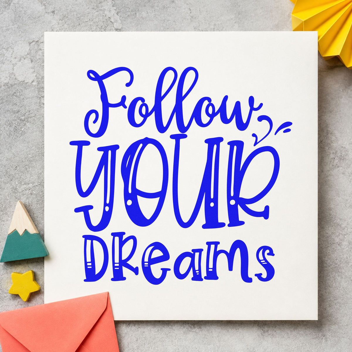 Follow Your Dreams Lettering craft stamp in blue ink on cardstock, an easy option for amp cover printing.