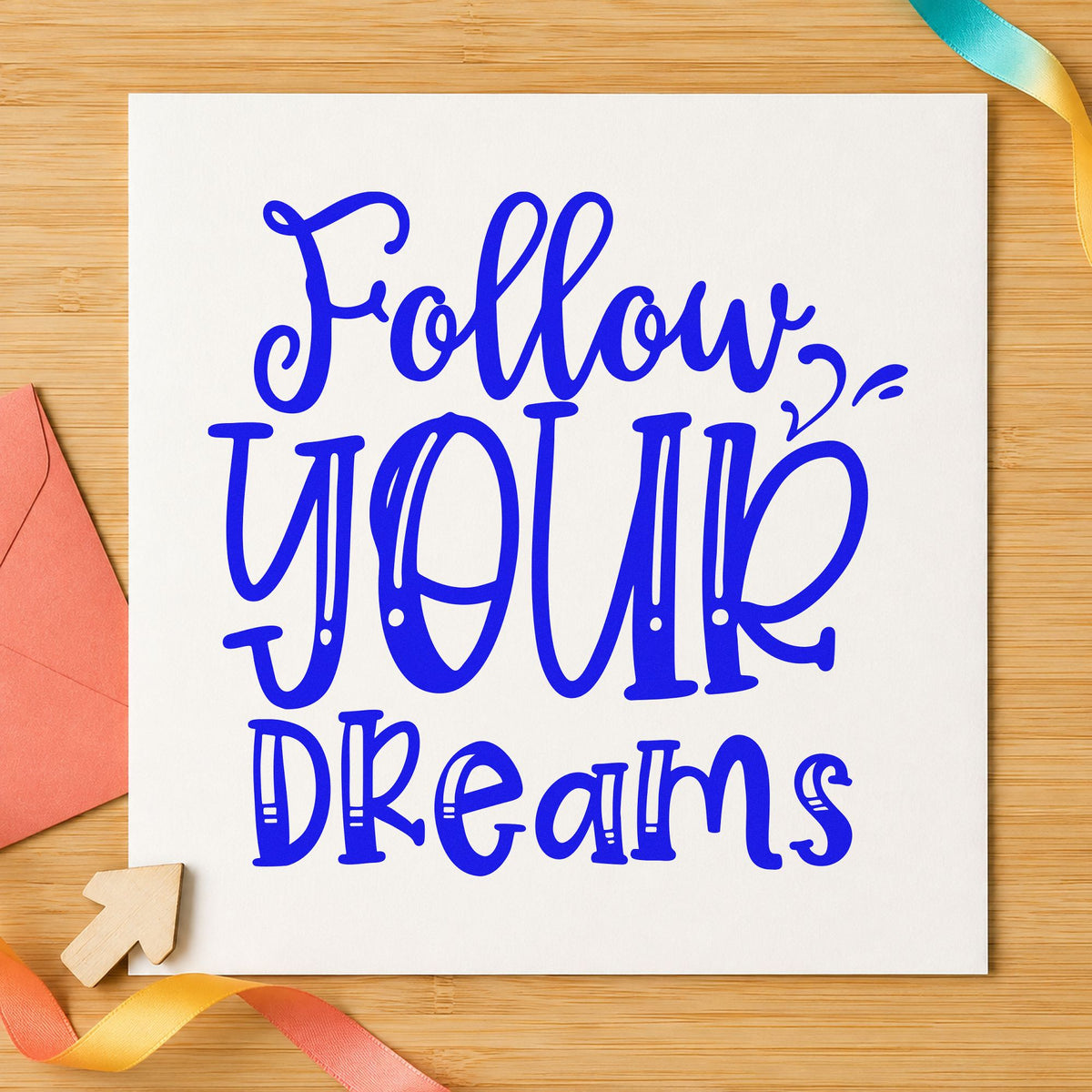 Follow Your Dreams Lettering craft stamp imprinted in blue ink on paper, a design suited to framed practice garage.