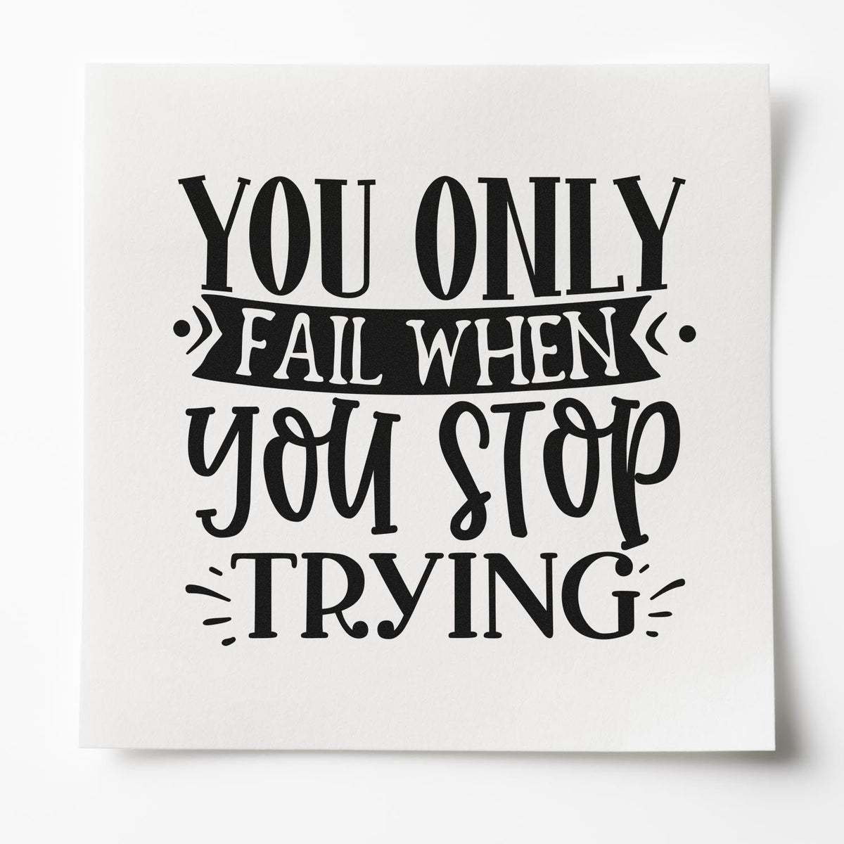 Motivational rubber stamp design with quote You only fail when you stop trying in bold black typography.