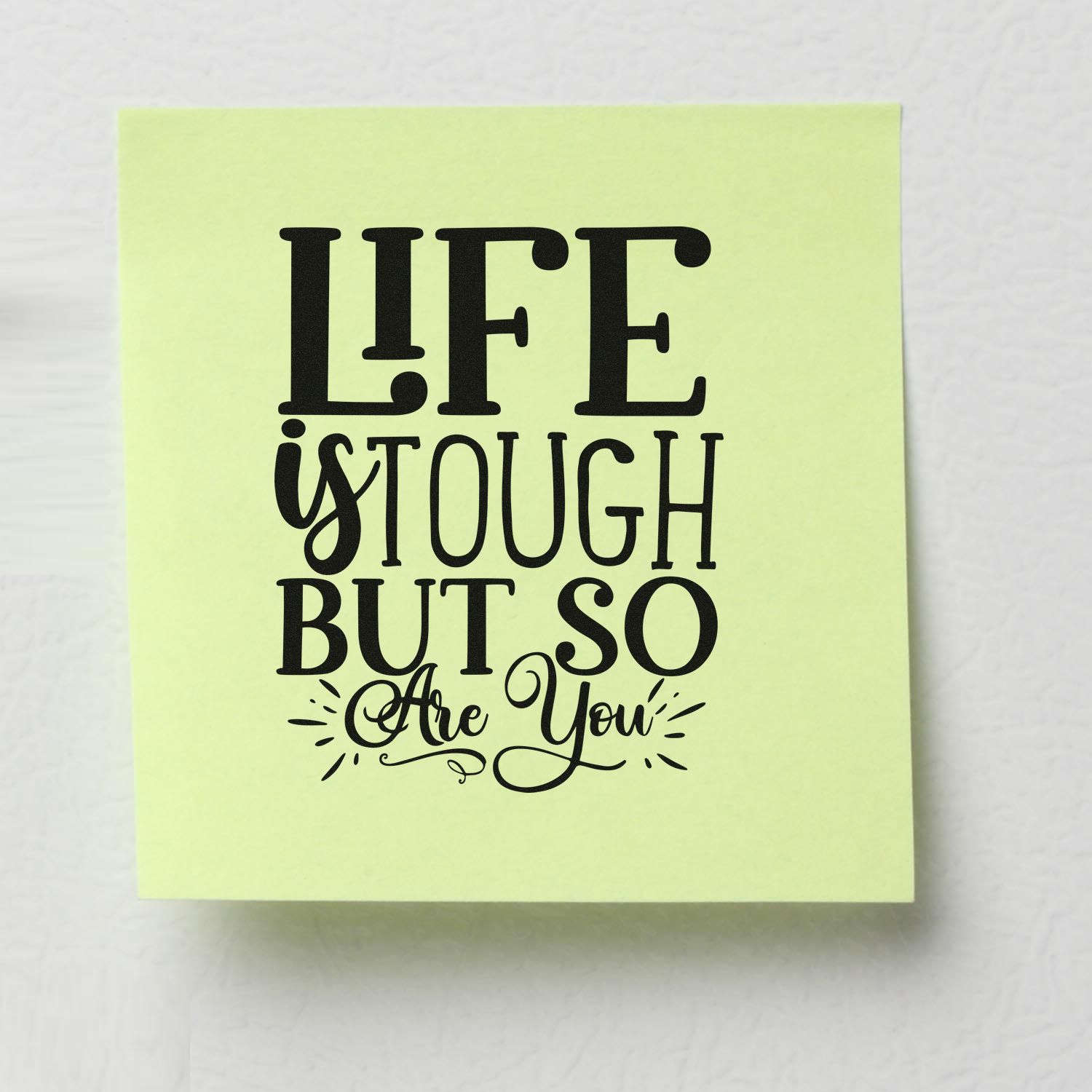 Motivational rubber stamp design reading Life is tough but so are you on a sticky note.