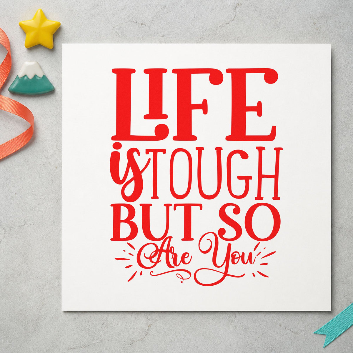 Life Tough But So You craft stamp imprint in red ink on a handmade project, one idea being jam note cards.