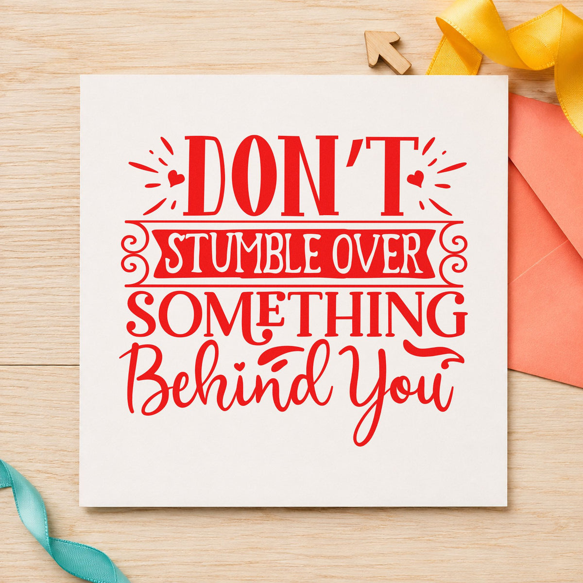 Don't Stumble Over Behind You rubber stamp shown in red ink, stamped for projects such as bin keep labels.