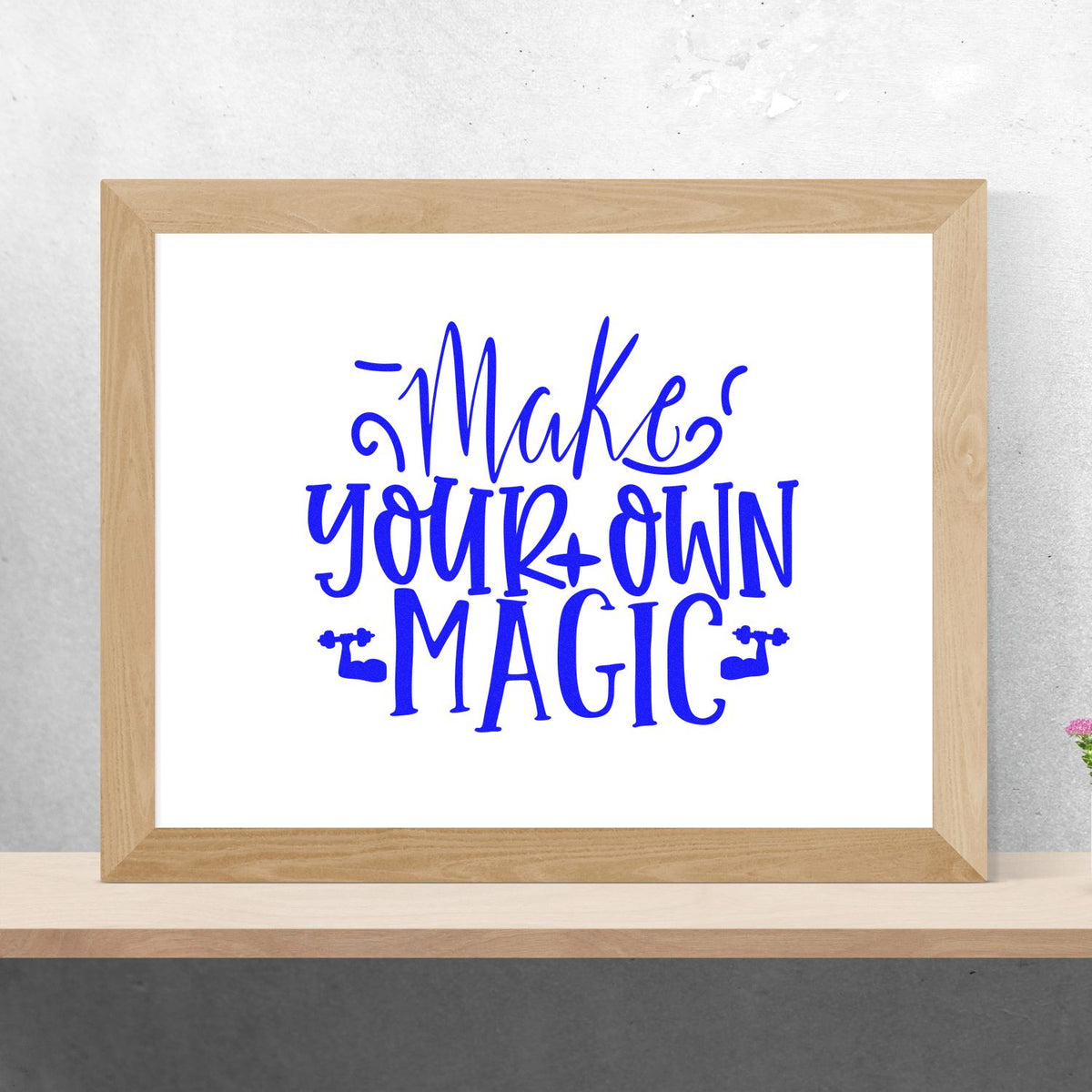 Make Your Own Magic custom rubber stamp design with playful blue lettering for crafting, stationery, and handmade branding.