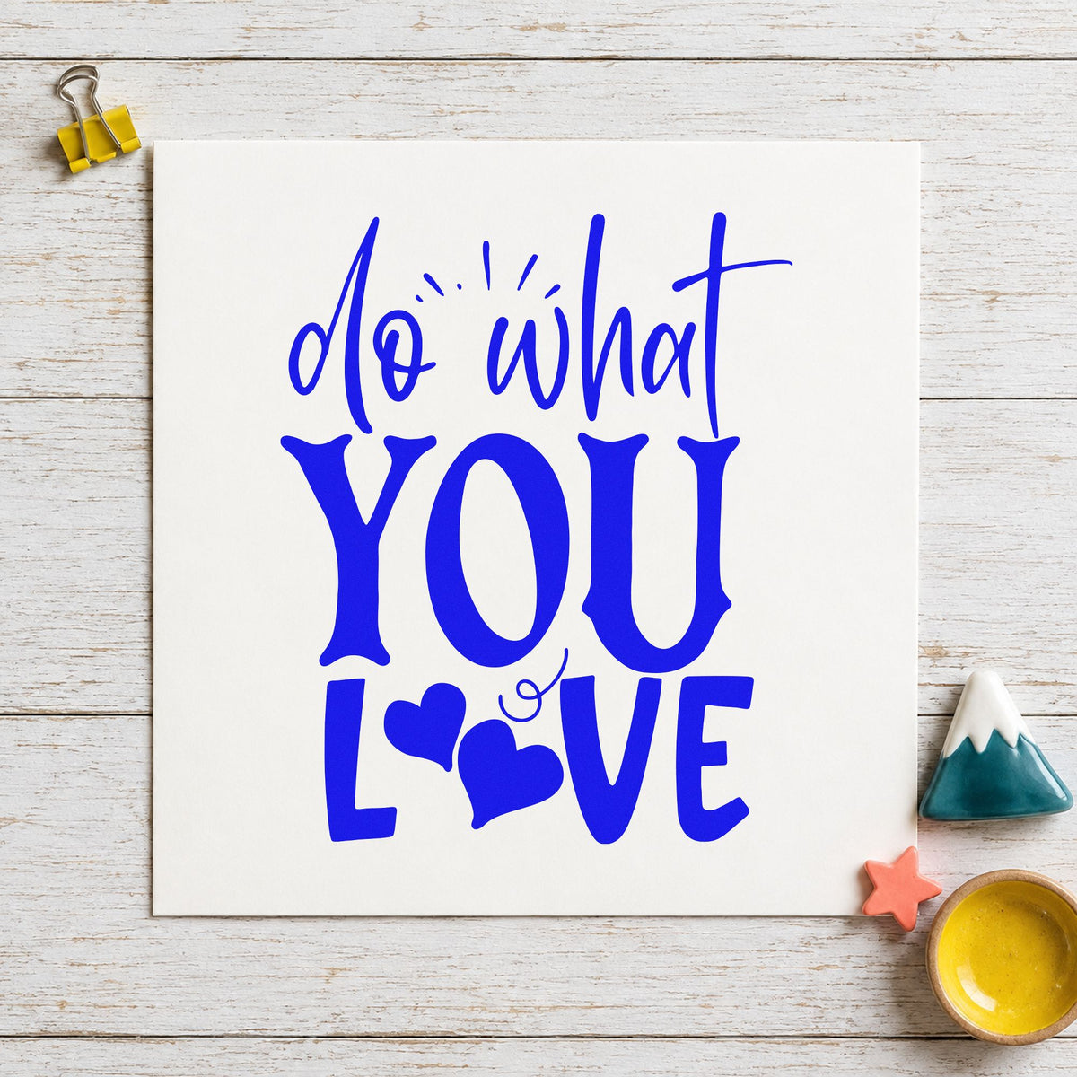 Do What You Love Hearts craft stamp imprinted in blue ink on paper, a design suited to framed pass rail.