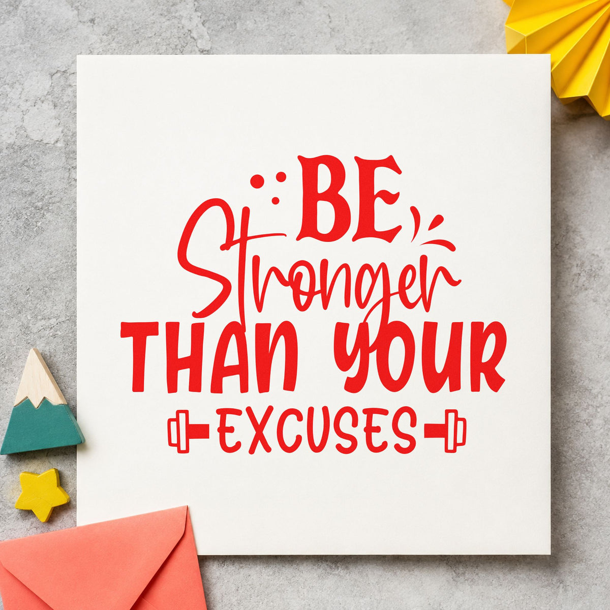 Be Stronger Than Excuses Dumbbells craft stamp imprint in red ink on a handmade project, one idea being ride goal cards.