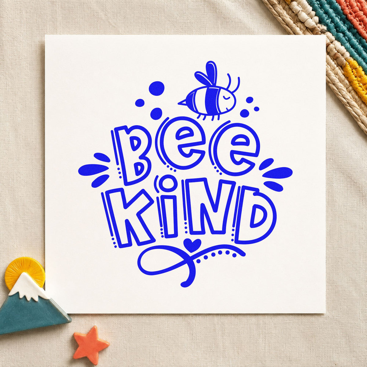 Bee Kind Bee Illustration craft stamp in blue ink on cardstock, an easy option for bee suit printing.