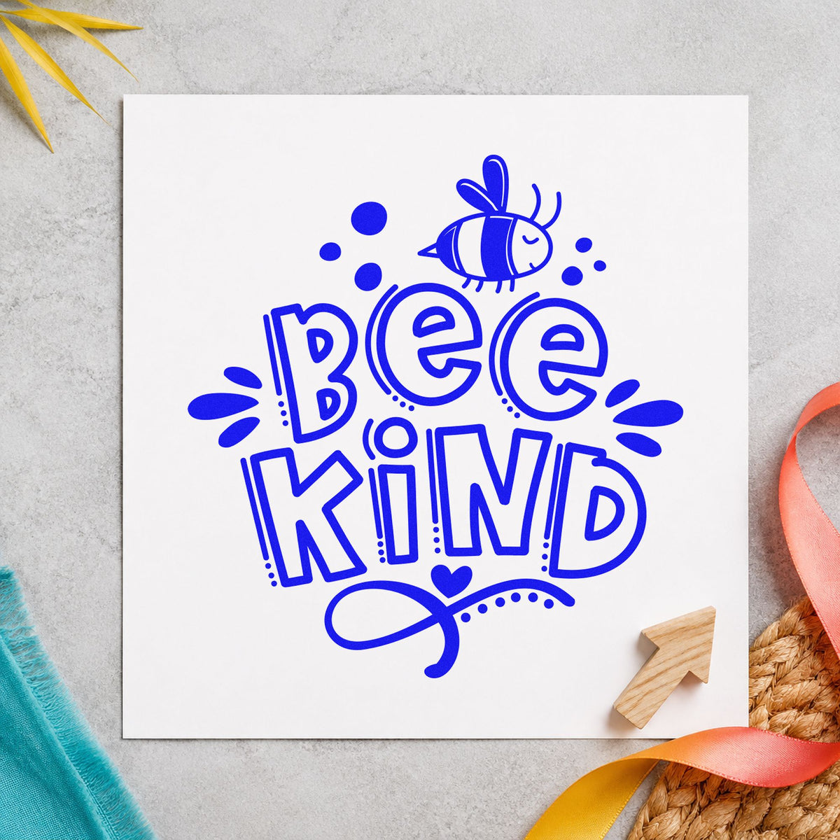Bee Kind Bee Illustration craft stamp imprinted in blue ink on paper, a design suited to framed honey house.