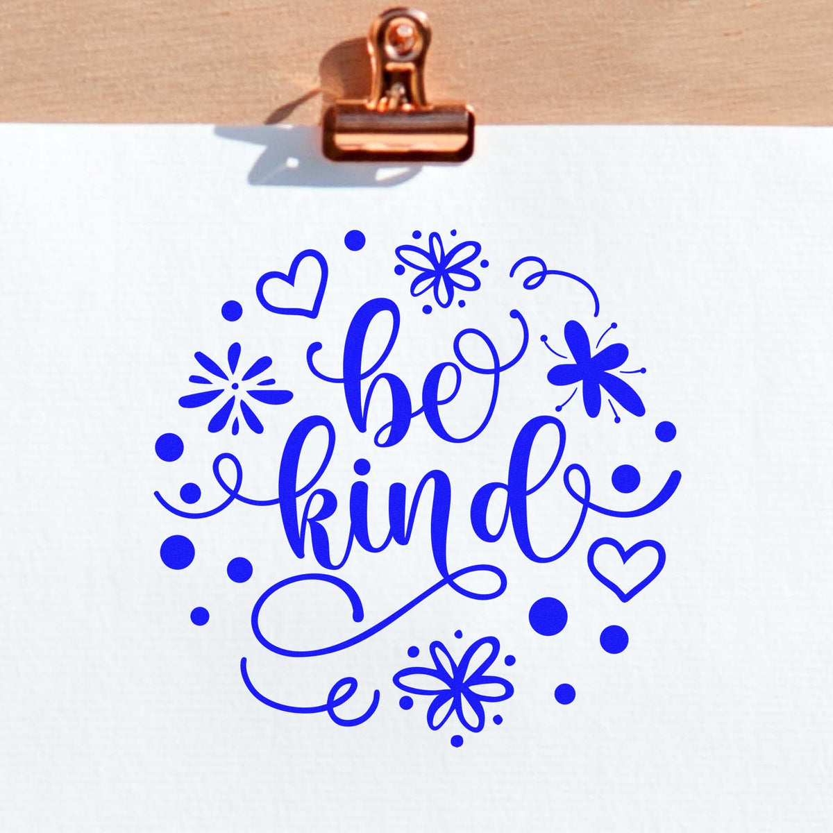 Be Kind floral rubber stamp design with blue hand-lettering, hearts and flowers for crafting, journaling, and stationery.