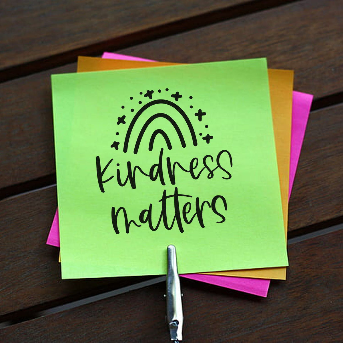 Custom Kindness Matters rubber stamp with rainbow on colorful sticky notes for handmade cards and DIY crafts.