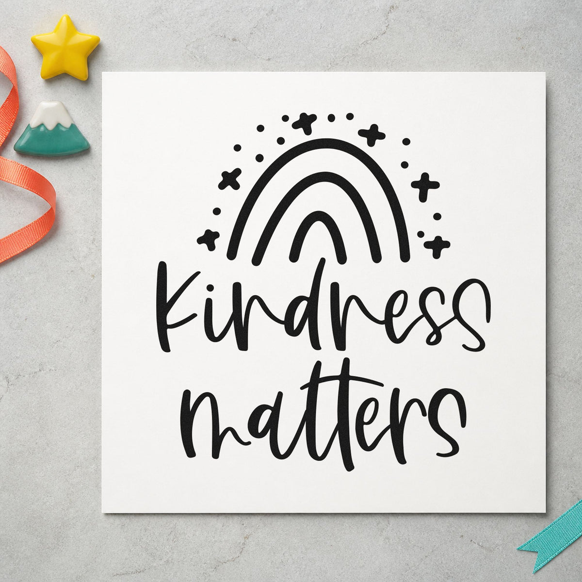 Kindness Matters Starry Rainbow rubber stamp printed in black ink, ready for ringed rainbow cards and similar paper crafts.