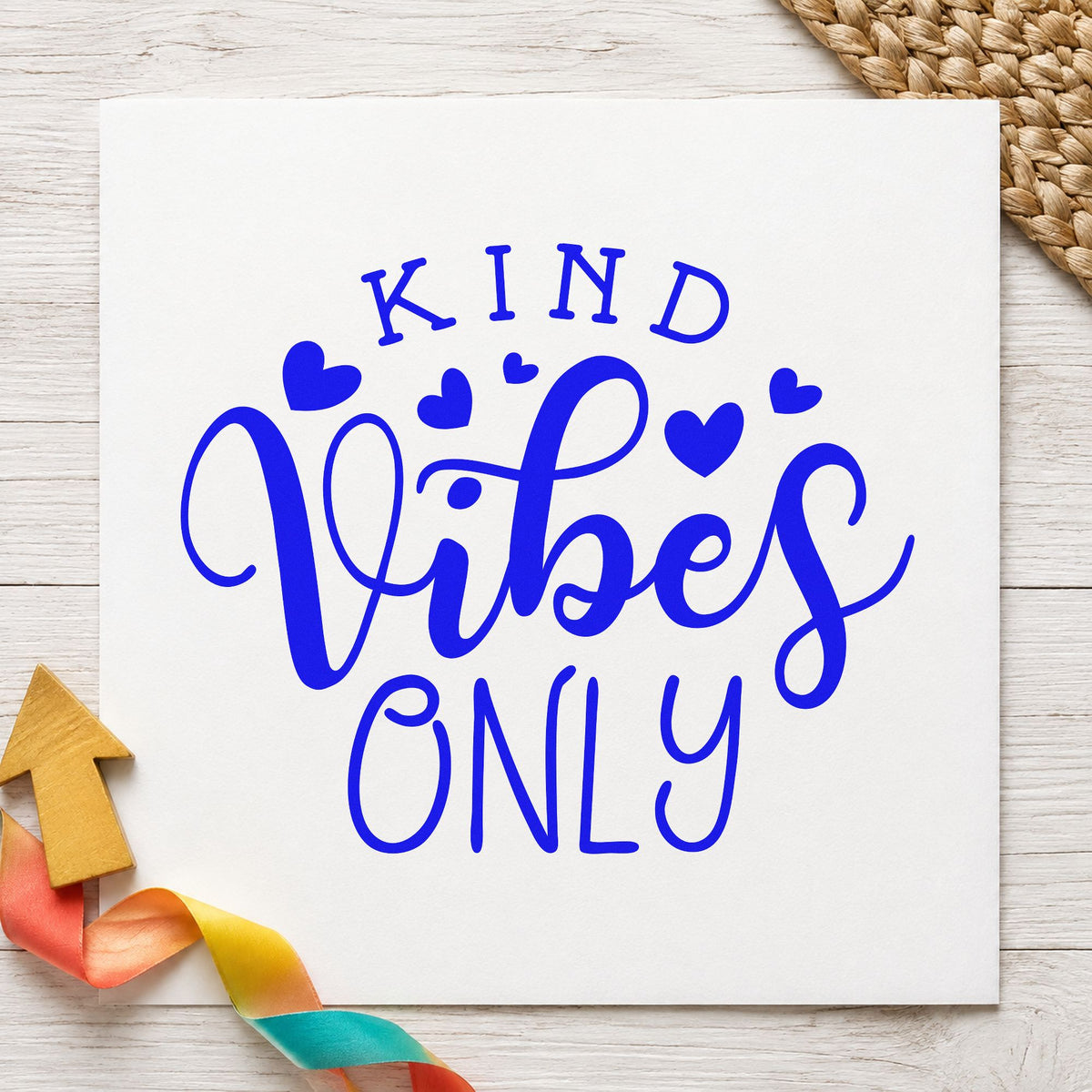Kind Vibes Only Hearts craft stamp imprinted in blue ink on paper, a design suited to framed shop ramp.