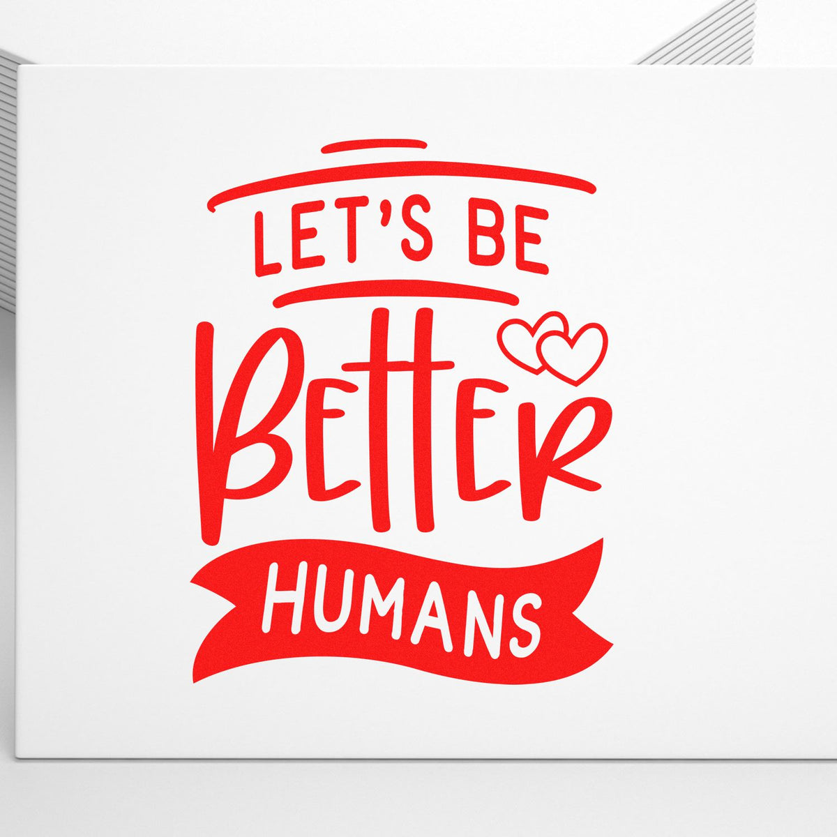Lets Be Better Humans rubber stamp design with hearts, featuring a bold red motivational message for handmade crafts and cards.