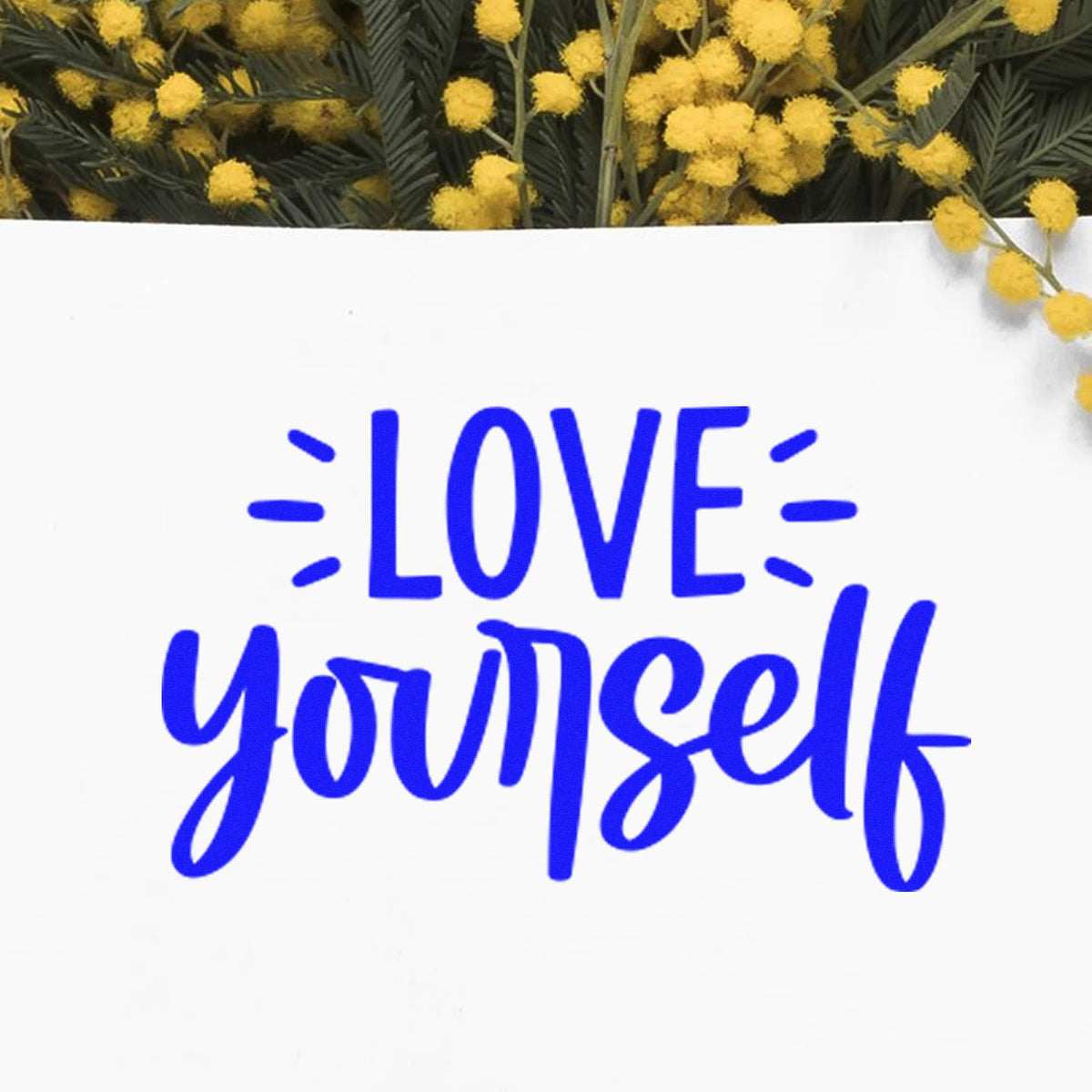 Love Yourself blue sentiment rubber stamp design with floral accents for handmade cards and self-care crafts.
