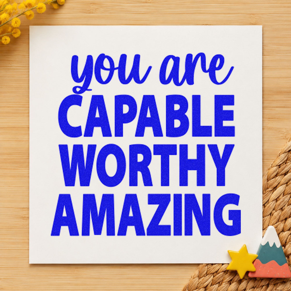 Capable Worthy Amazing Lettering craft stamp in blue ink on cardstock, an easy option for scrub cap printing.