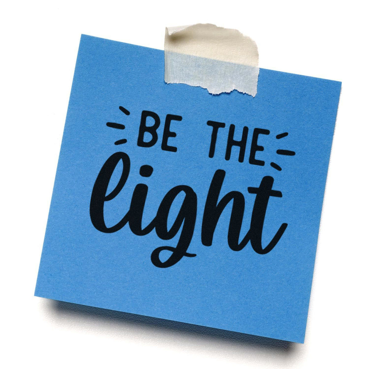 Be the Light motivational rubber stamp design on a blue sticky note, perfect for uplifting cards, journaling, and crafts.
