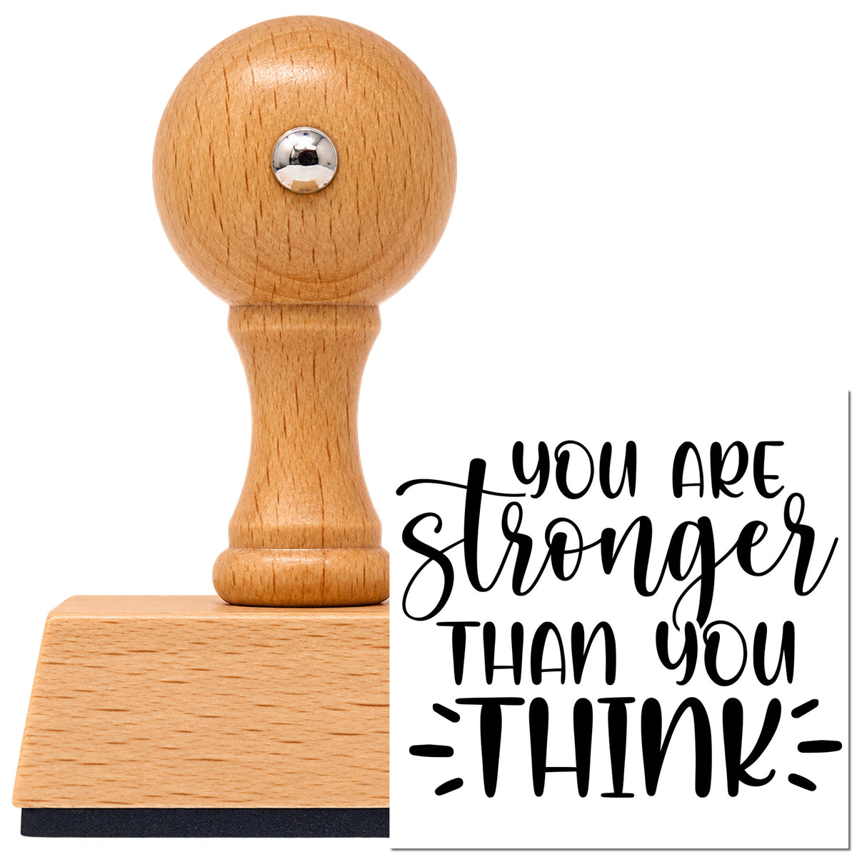 You Are Stronger Than Think Vintage Pro rubber stamp in European beech wood with a round knob handle, shown beside its black imprint.