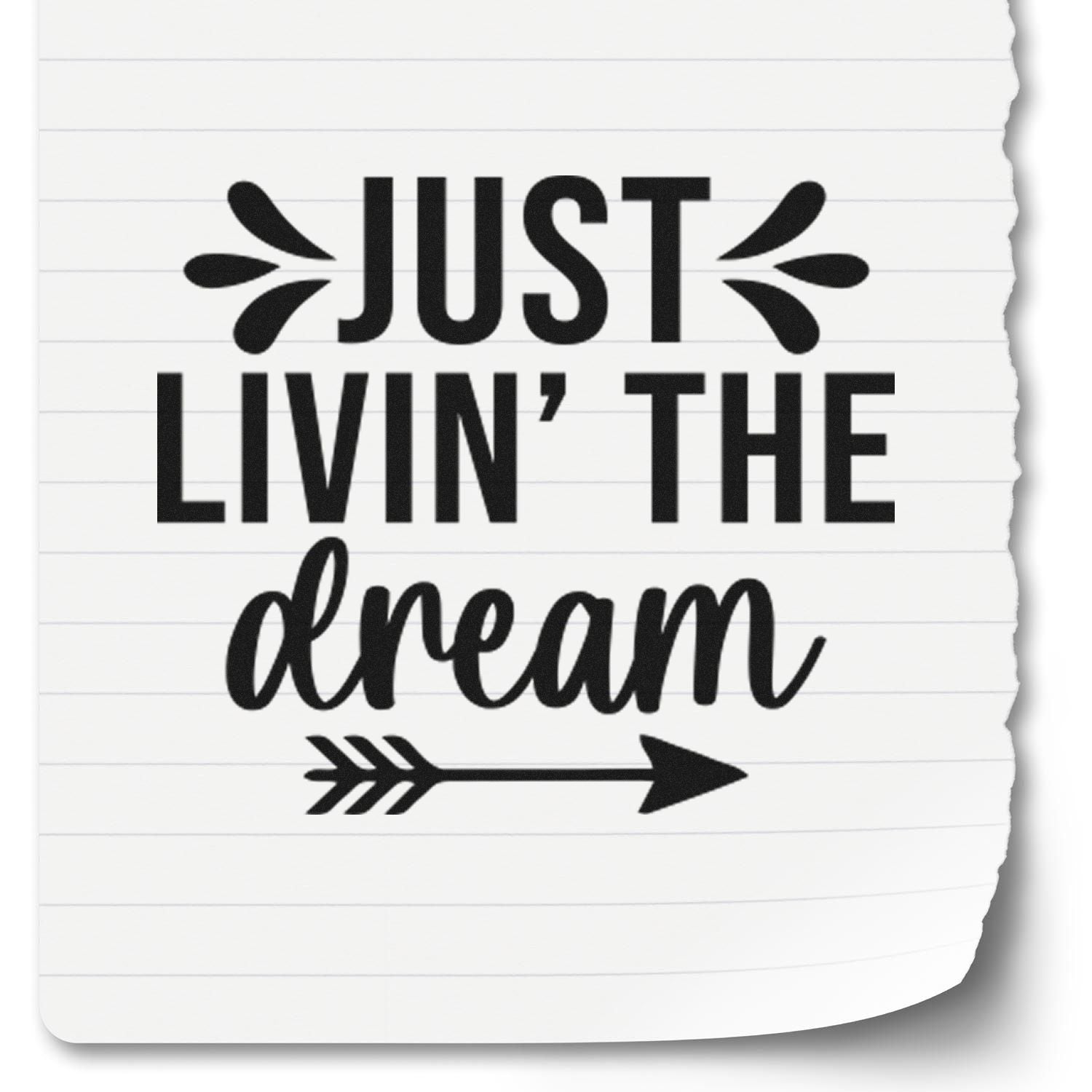 Inspirational rubber stamp design reading Just Livin the Dream with arrow accents on torn notebook paper.